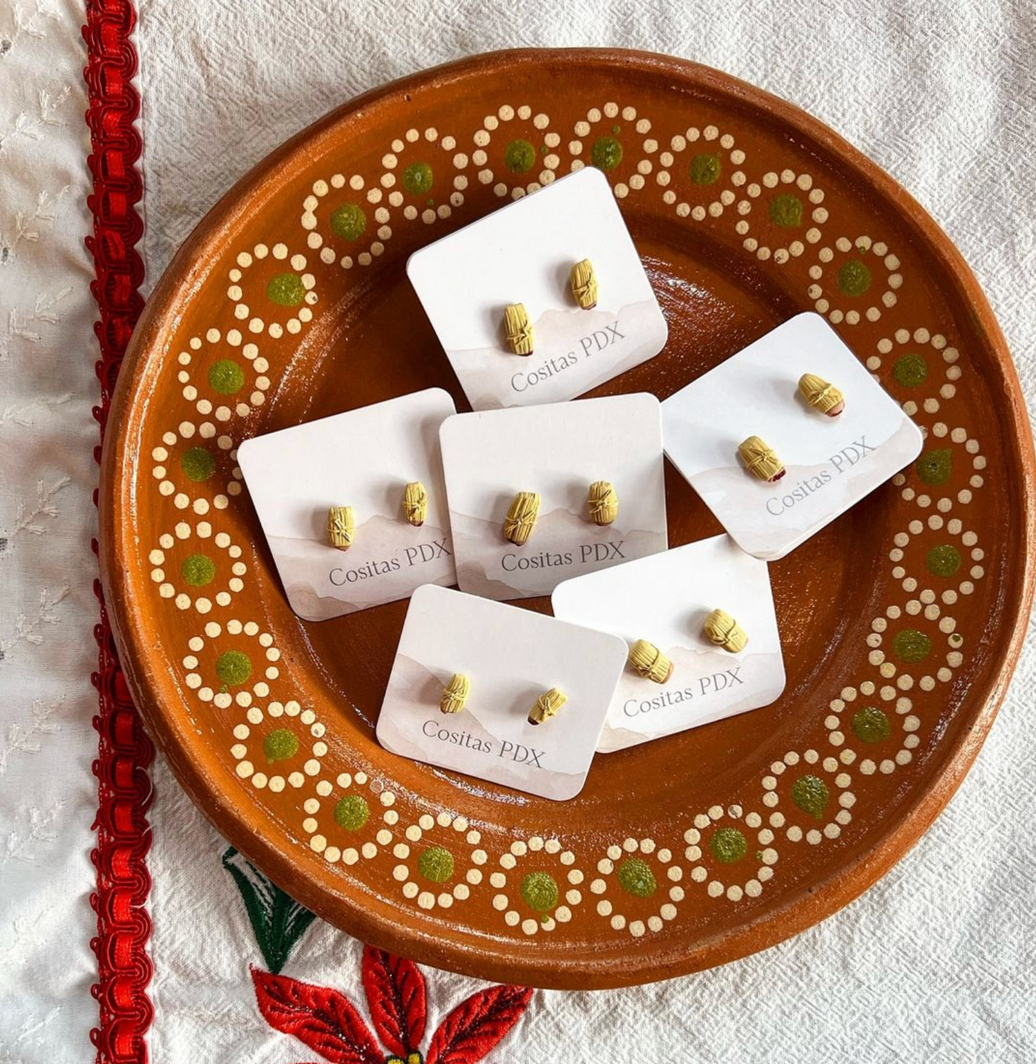 Tamale earring studs made from polymer clay
